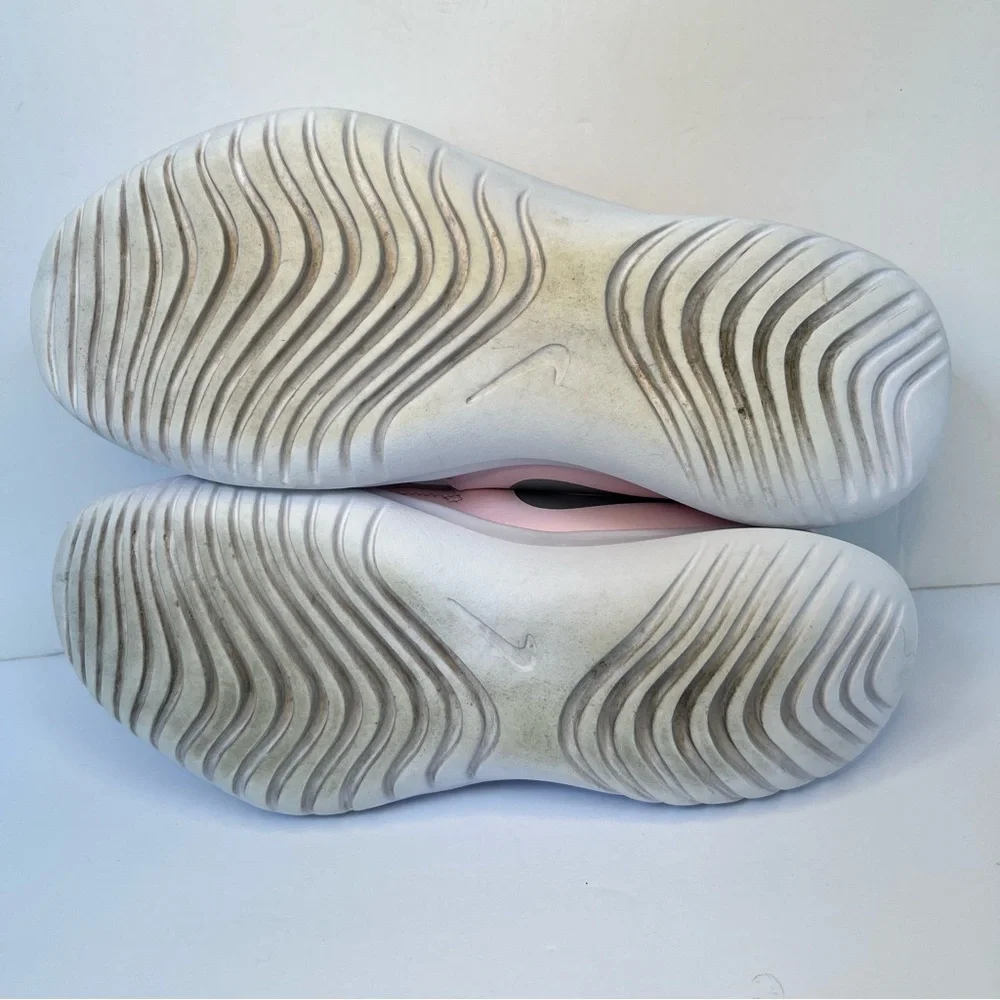 Nike Pink‎ Slip-On Sneakers with Streamlined Design